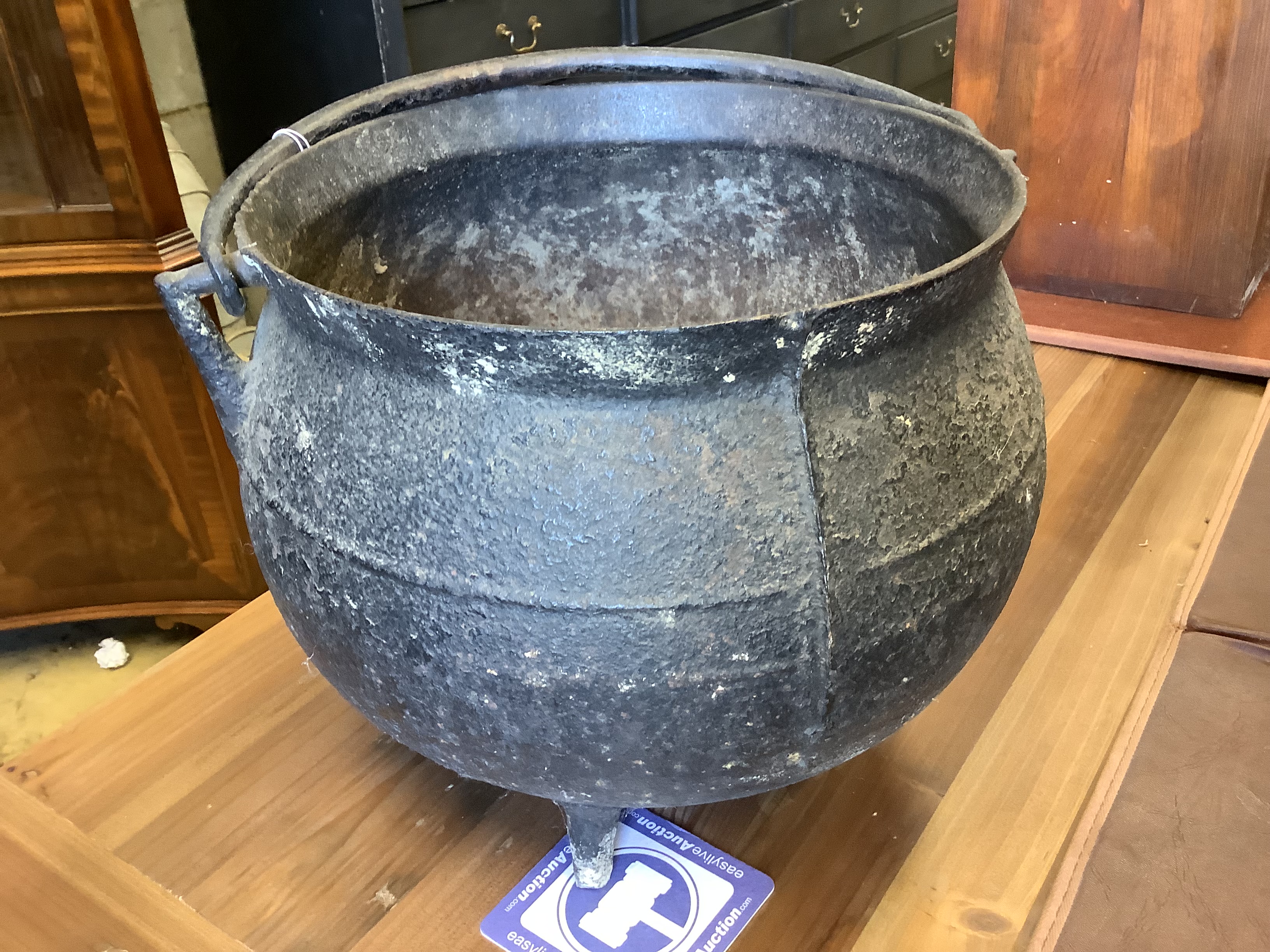 A cast iron cauldron, diameter 31cm, height 28cm